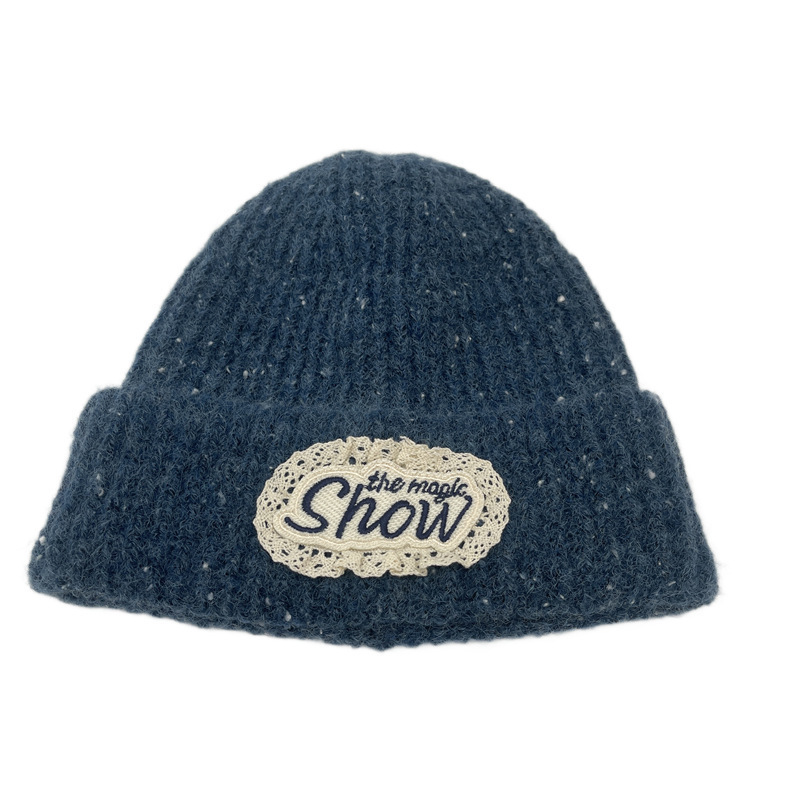 Lace lettered knitted unisex beanie with solid color snowflake dot ribbed brim and ear protection for warmth