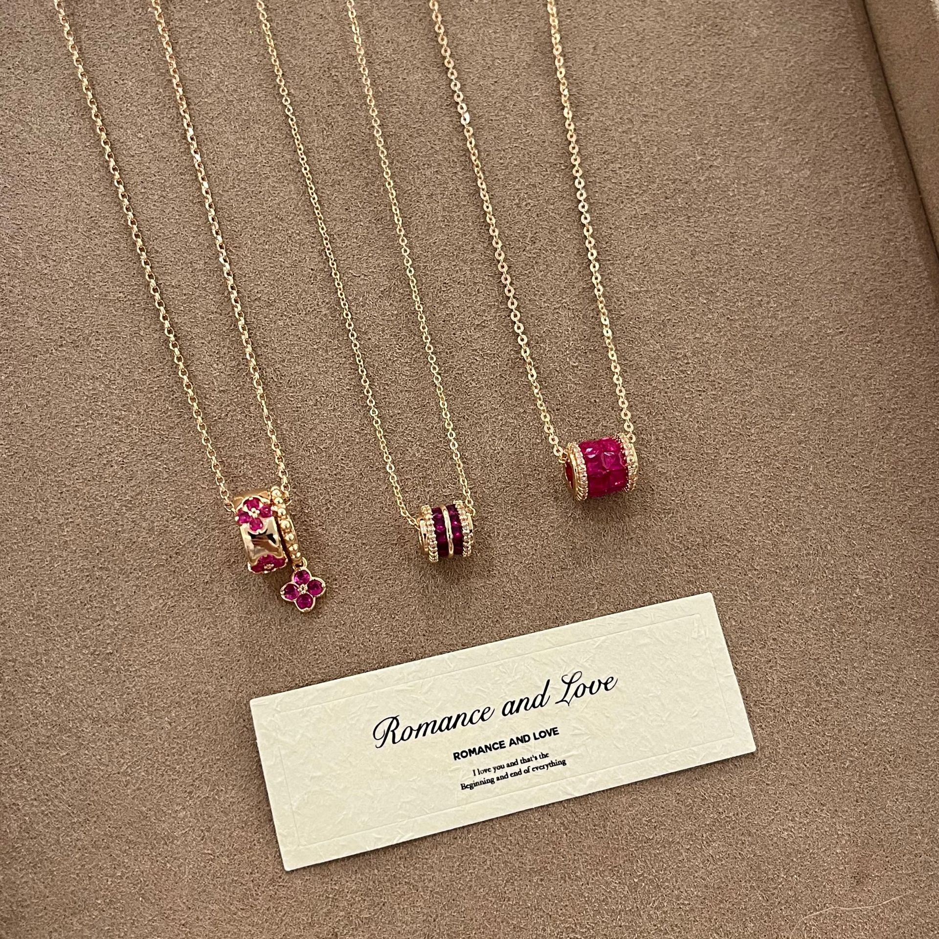 Vintage hollow embroidered hydrangea necklace set, featuring purple-pink four-leaf clover design with micro-paved cubic zirconia, a unique and styli