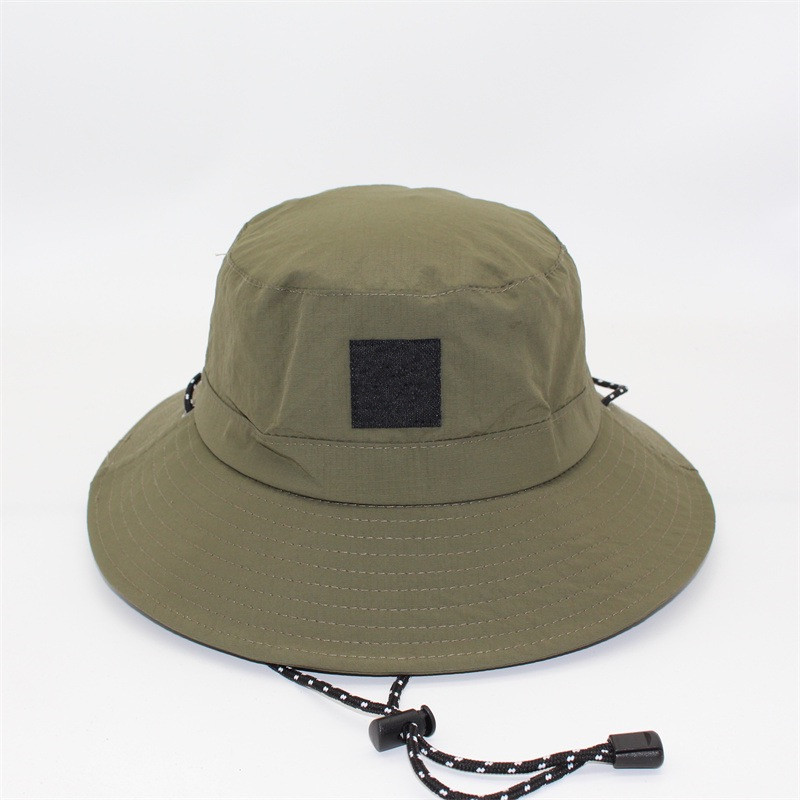 Outdoor fisherman's hat with wide brim for sun protection during summer outings. Bucket hat for men and women in solid color. Fishing hat for b