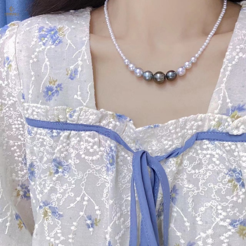 S925 sterling silver necklace featuring 3-11mm gradient-colored seawater paired with white freshwater mabe pearls, and Tahitian pearls