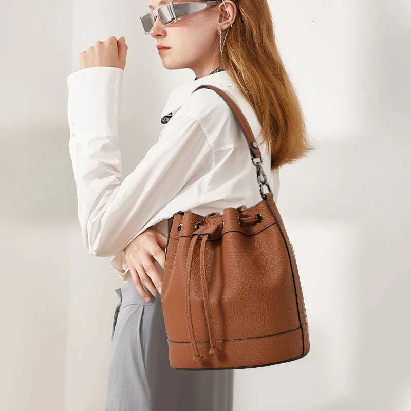 Evening Bags First-Layer Crystal Vegetable Tanned Cowhide Balloon Bag 2026 New Niche Design Drawstring Mini Hand Bucket Bag H261016