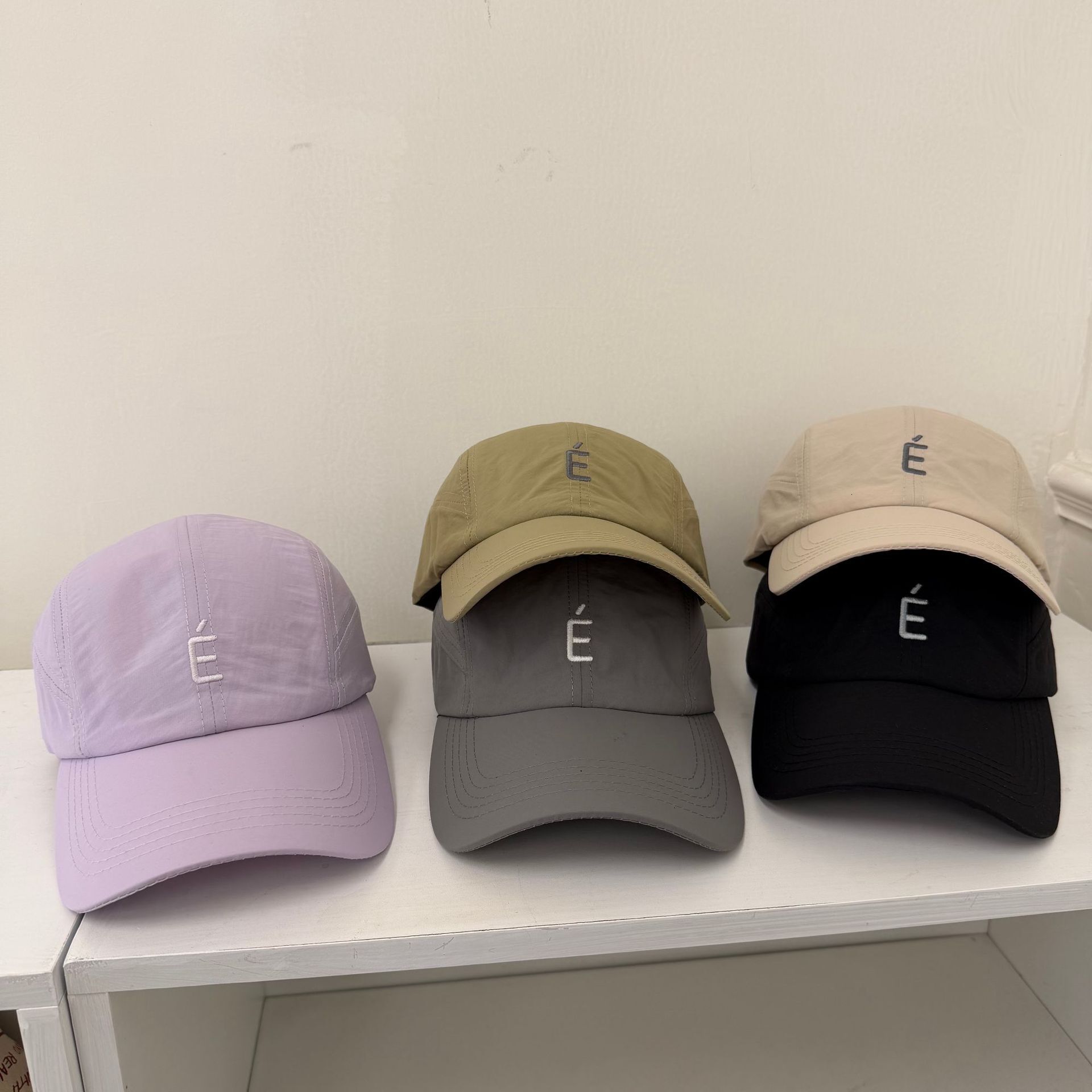 Koreanstyle Eletter embroidered thin drawstring quickdrying baseball cap unisex for spring and summer outdoor sports providing sun protection