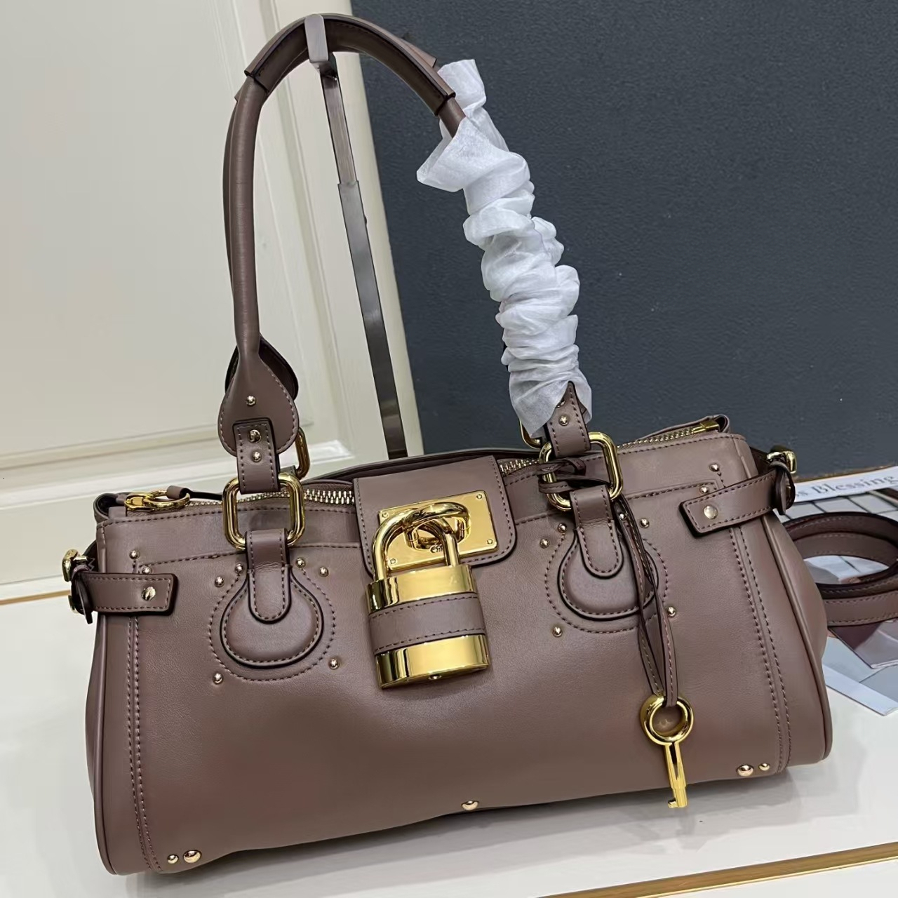Top handbags designers Paddington Bags Full genuine leather shoulder crossbody bag Vintage Fashion Lock Moto Bag Versatile Commuter Handbag with Riv