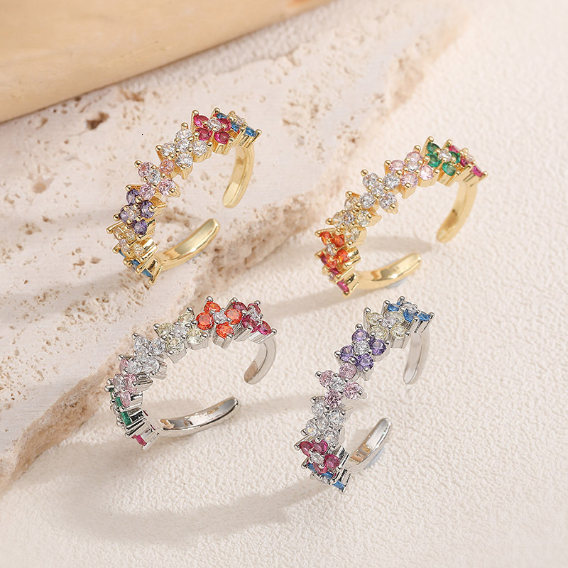 V brand ring Elegant luxurious copper ring colorful diamond accents, featuring four-leaf clover design, end piece with a dazzling floral petal openi