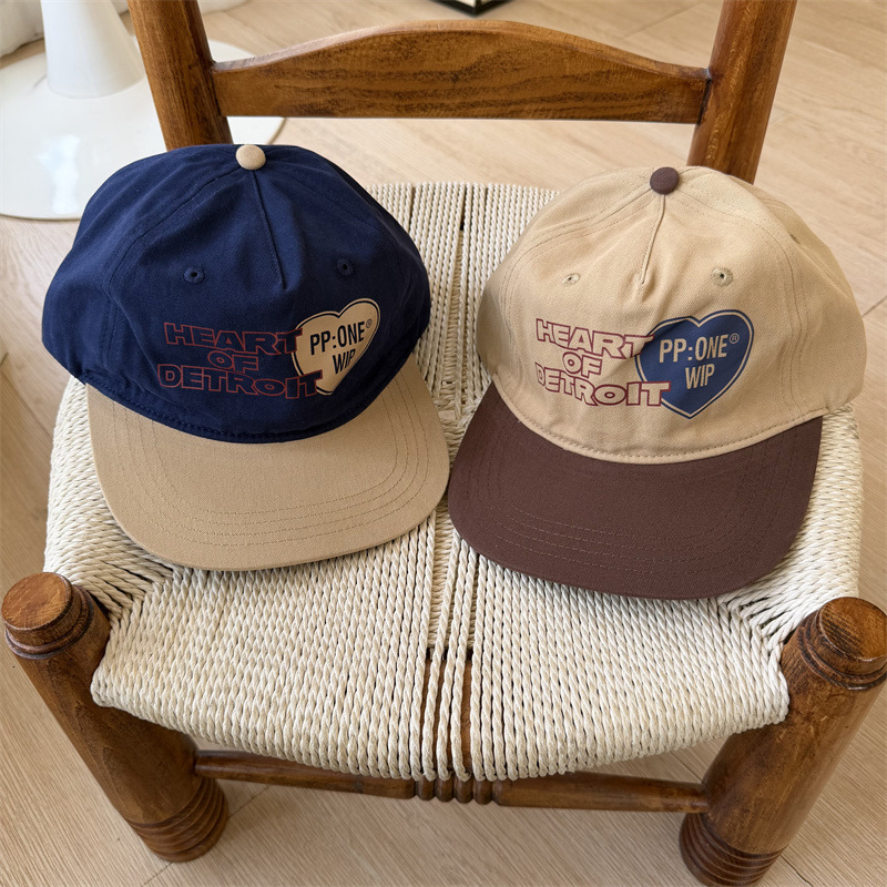 Simple colorblocked heart letter design flatbrimmed cap unisex fashionable versatile casual sunprotective and trendy baseball cap
