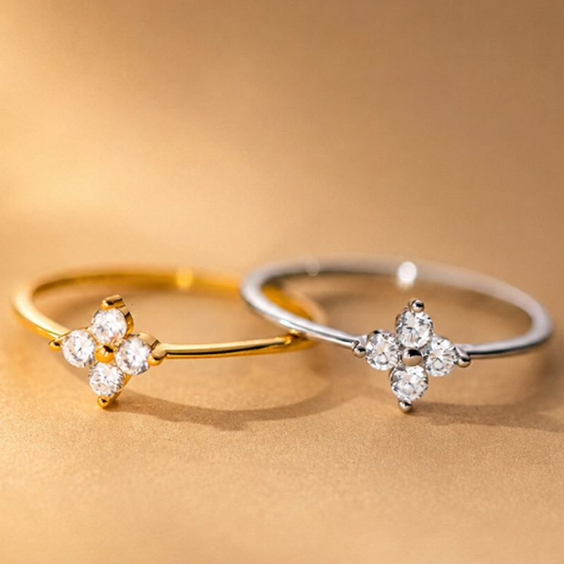 V brand ring French-style, minimalist luxury four-leaf clover ring delicate cubic zirconia accents unique and trendy piece of jewelry with a high-en