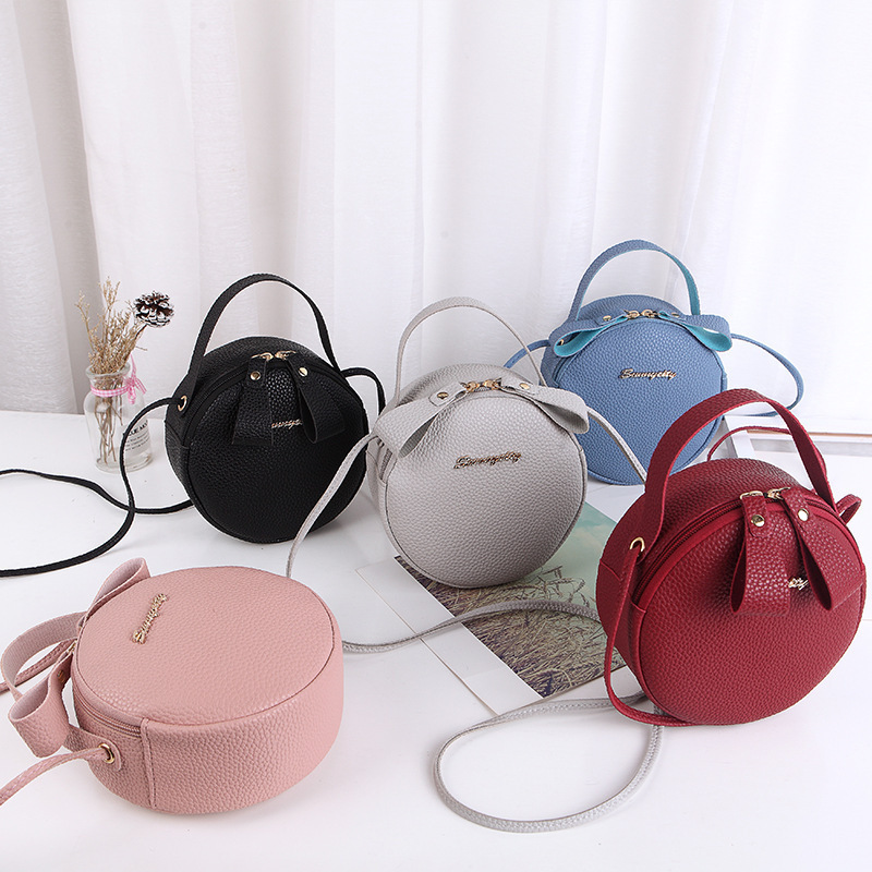 Spring New Women's Cute Round Single Shoulder Crossbody Handheld Makeup Wholesale Small Bag Kl928