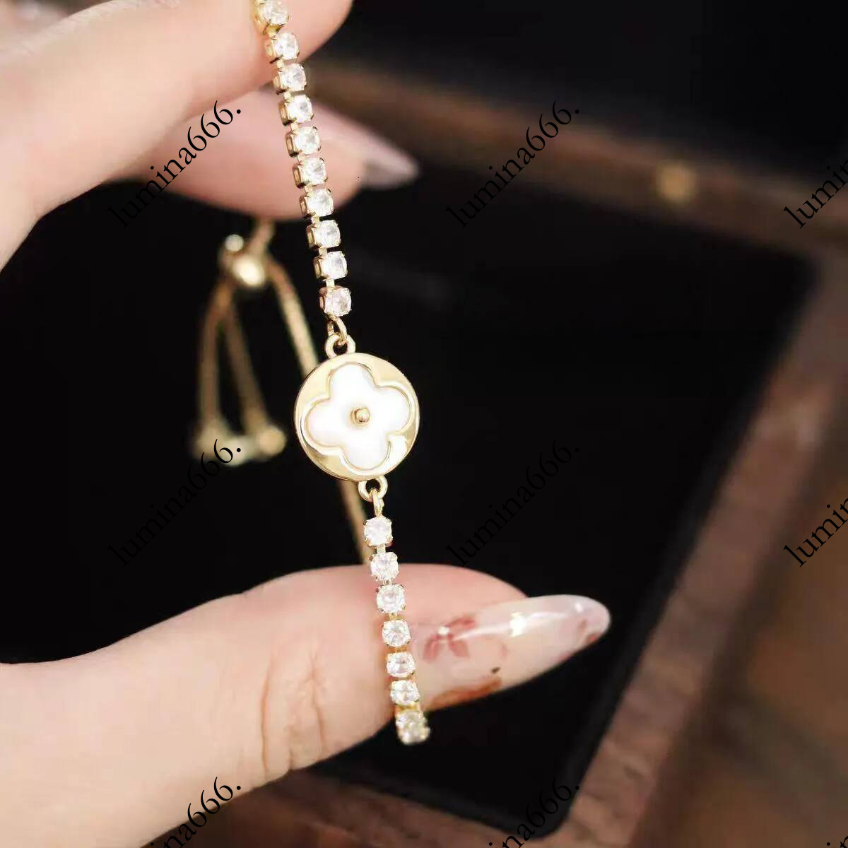Light Luxury Diamond Studded High End Four Leaf Clover Bracelet With Natural Mother Of Pearl Inlay Delicate And Elegant