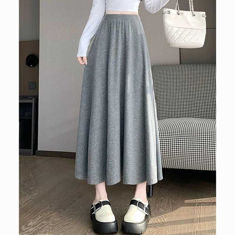 High s Designer Skirts 2026 Waist Shinny Midi Skirts Lady Fashion Casual A-line Dress Women Korean Slim Fit Thin Skirts W261017
