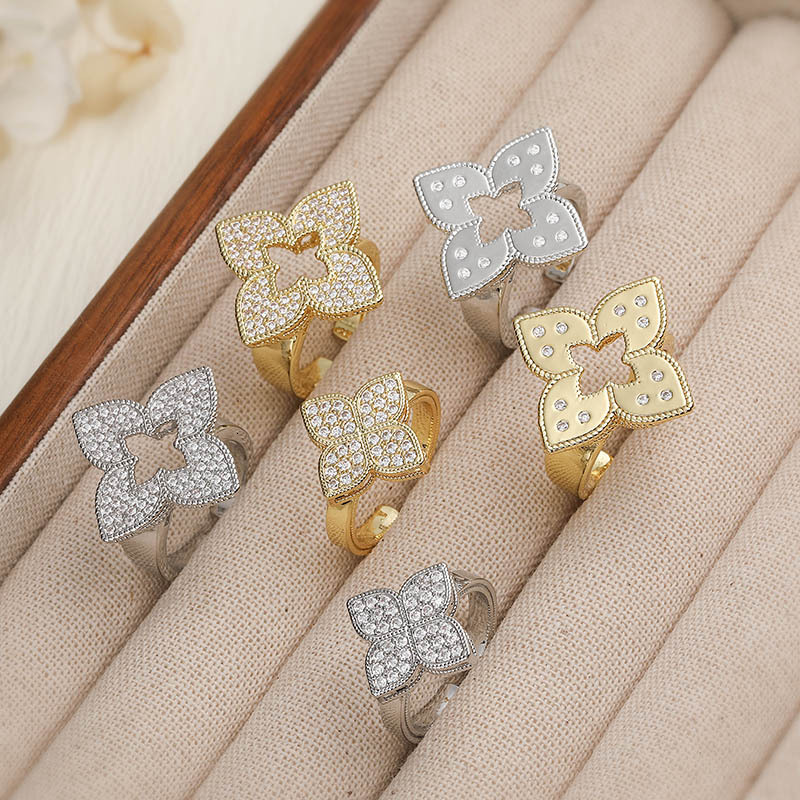 V brand ring Exquisite luxurious copper with zirconia inlays, featuring hollowed-out four-leaf clover design, a unique and high-end floral petal-sha