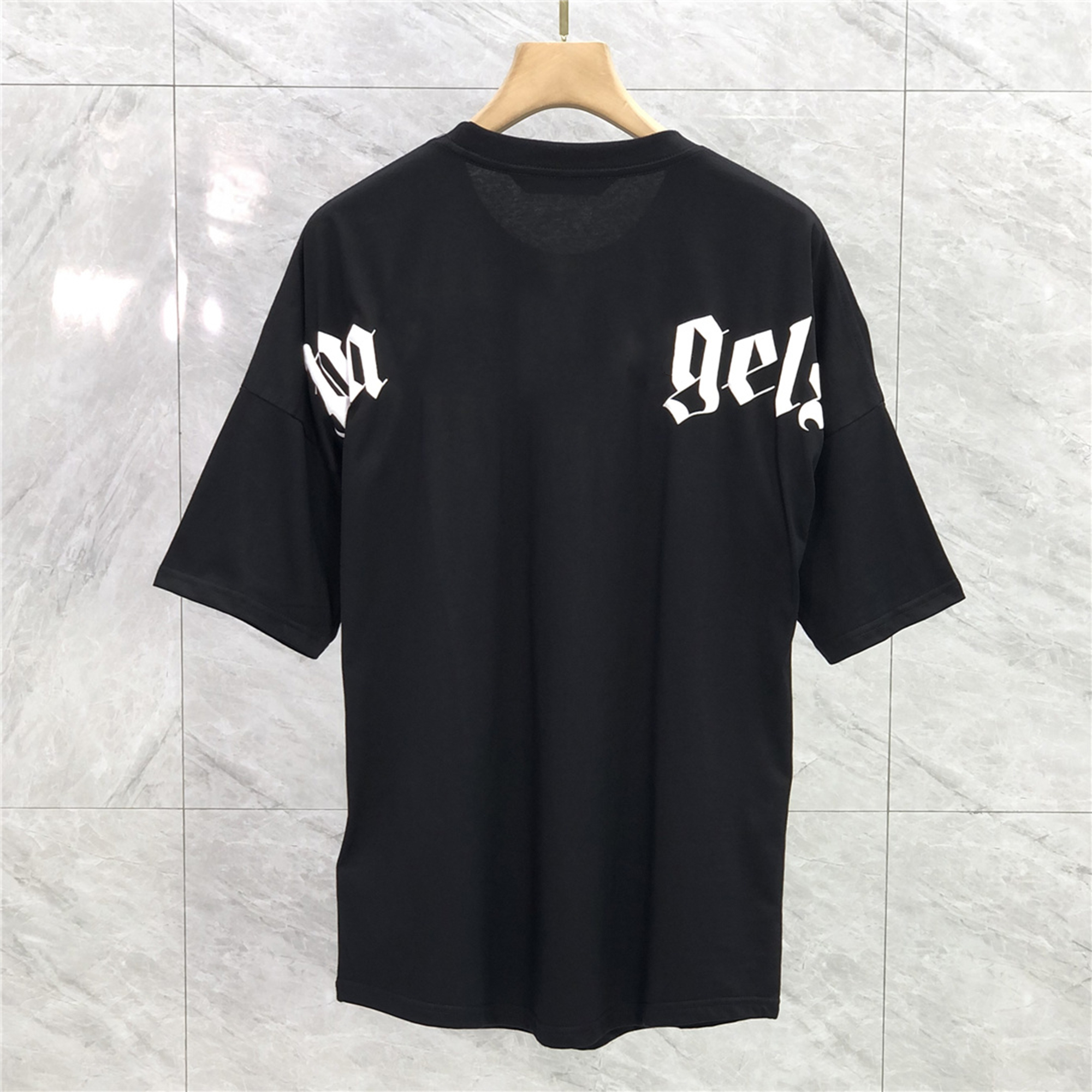 Designer Men's women's letter printed T-shirt luxury loose casual round neck fashionable top summer cotton short sleeved T shirt men Women