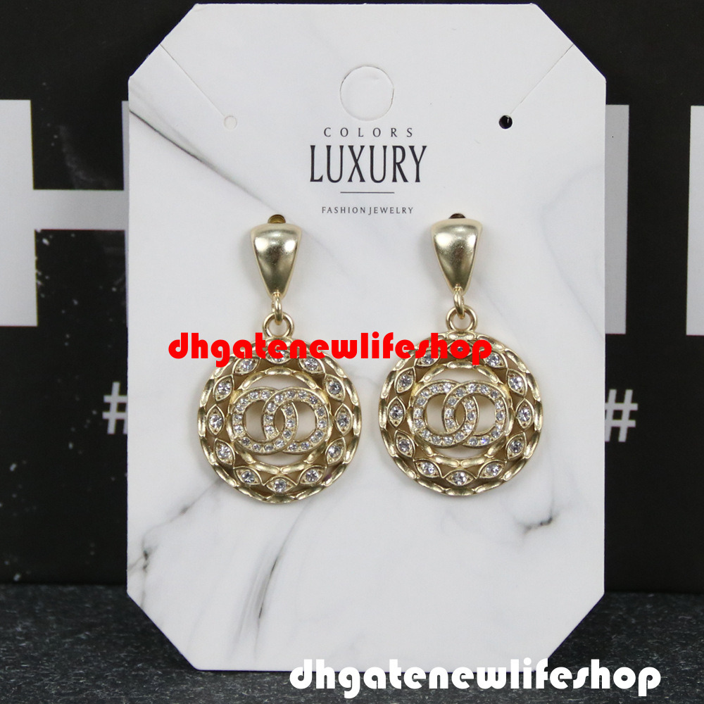 designer cc jewelry earrings 2873 Glossy Metal Geometric Round Pendant Earrings Hollowed-Out Horse-Eye Crystal Embellishments channel earrings
