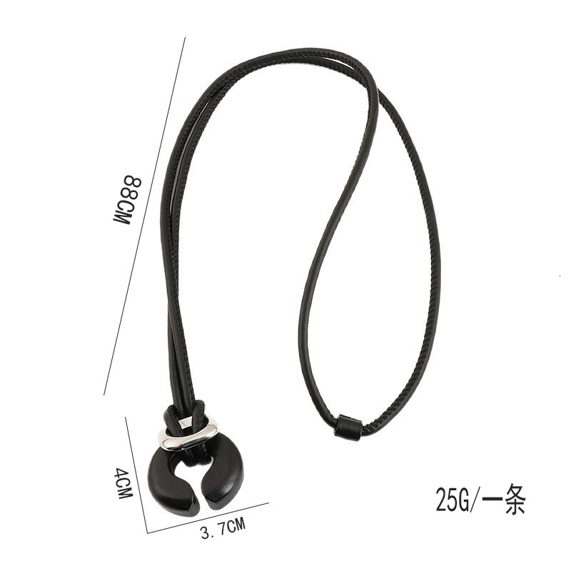 black ebony silver geometric necklace, 2025 new collection, minimalist and chic design, long leather cord necklace