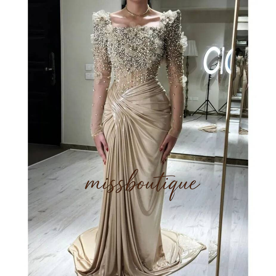 2025 Elegant Champagne Mermaid Evening Dresses Crystals Beads Long Slves Formal Occasion Gowns With 3D Floral Appliques Pleats Celebrity Mother Dres