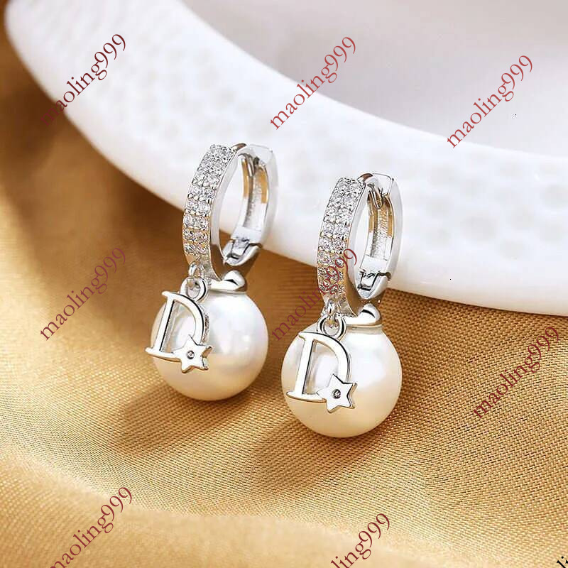 bijoux de luxe perle boucles d'oreilles en forme de D nouvelle mode coréenne à la mode clips élégants style en ligne populaire accessoires d'orei
