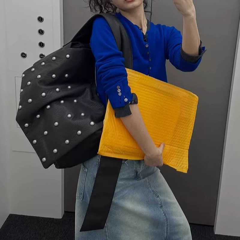 Korean niche women's bag, large capacity rivet shoulder crossbody tote springsummer new style, personalized