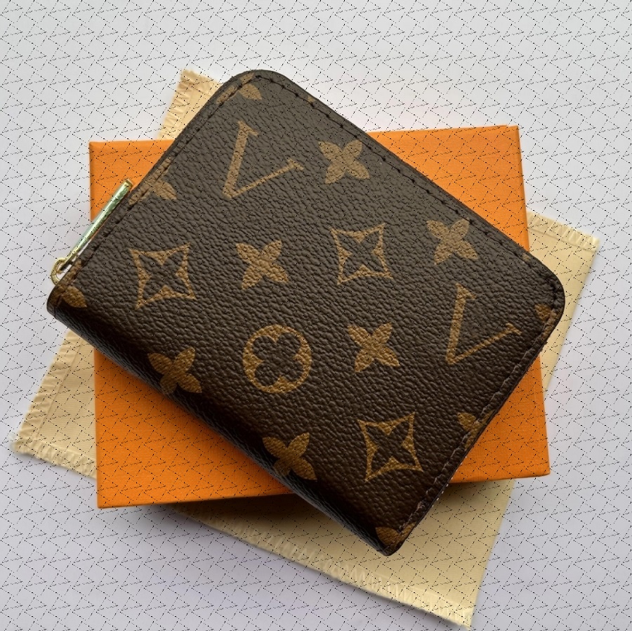 Designers luxurys Purses KEY POUCH POCHETTE CLES Women Mens Key Ring Credit Card Holder Coin Purses Mini Wallet Bag with box and dustbag 60023 61665