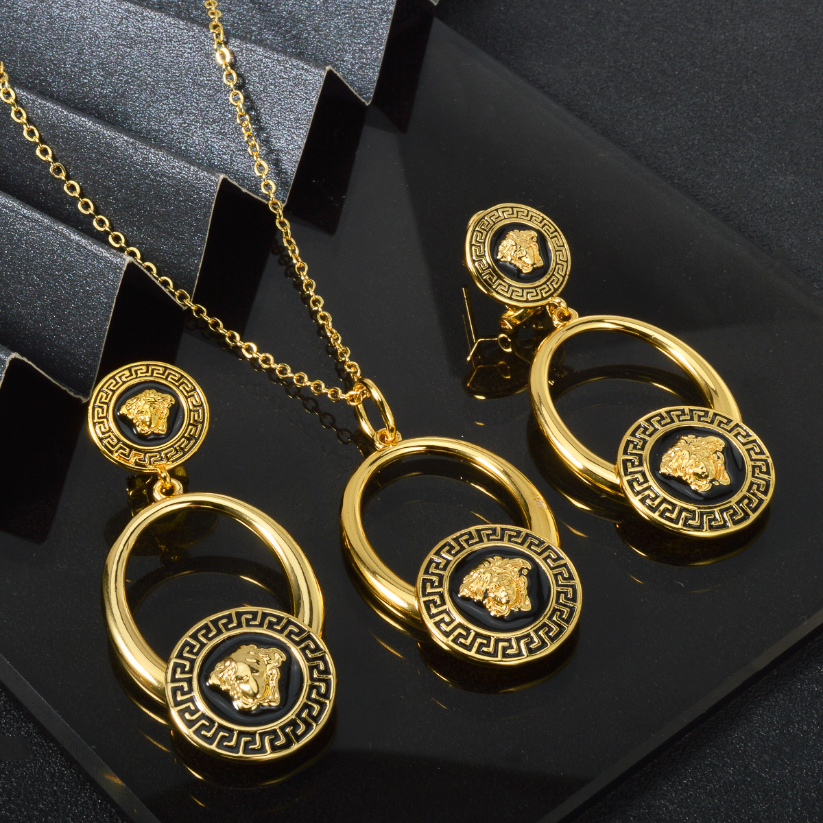 European American fashion jewelry set with high-end black gold color scheme, featuring a portrait relief necklace, pendant, and earrings