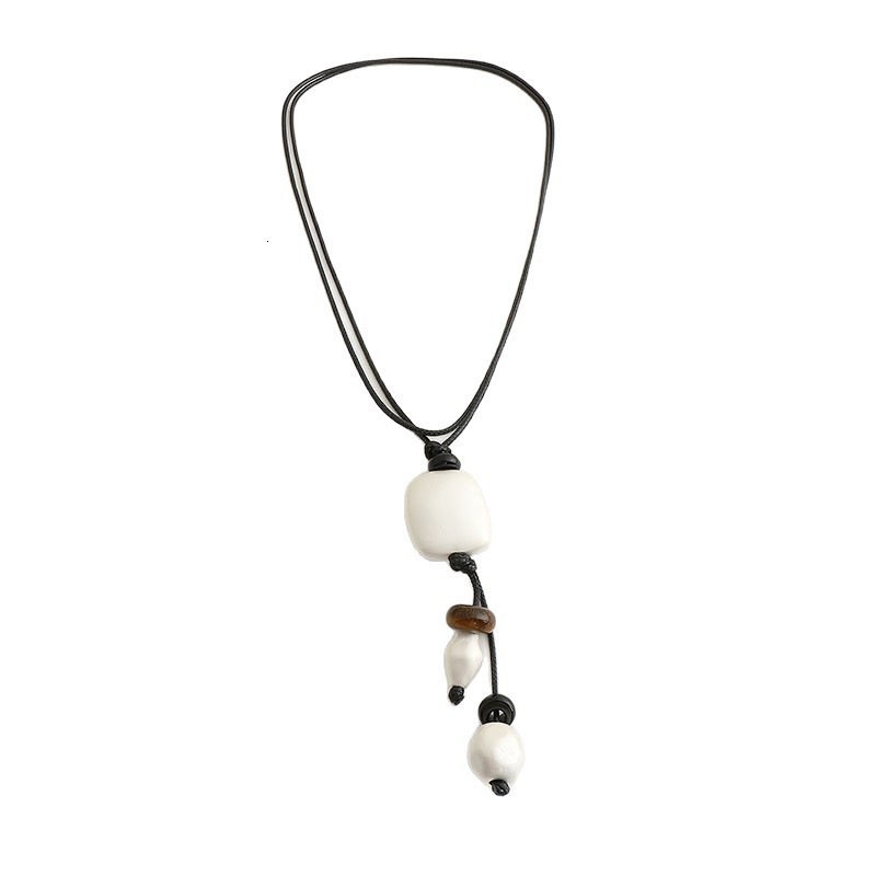 knotted sculpture matte irregular agate stone pendant necklace for women, niche design, elegant long sweater chain