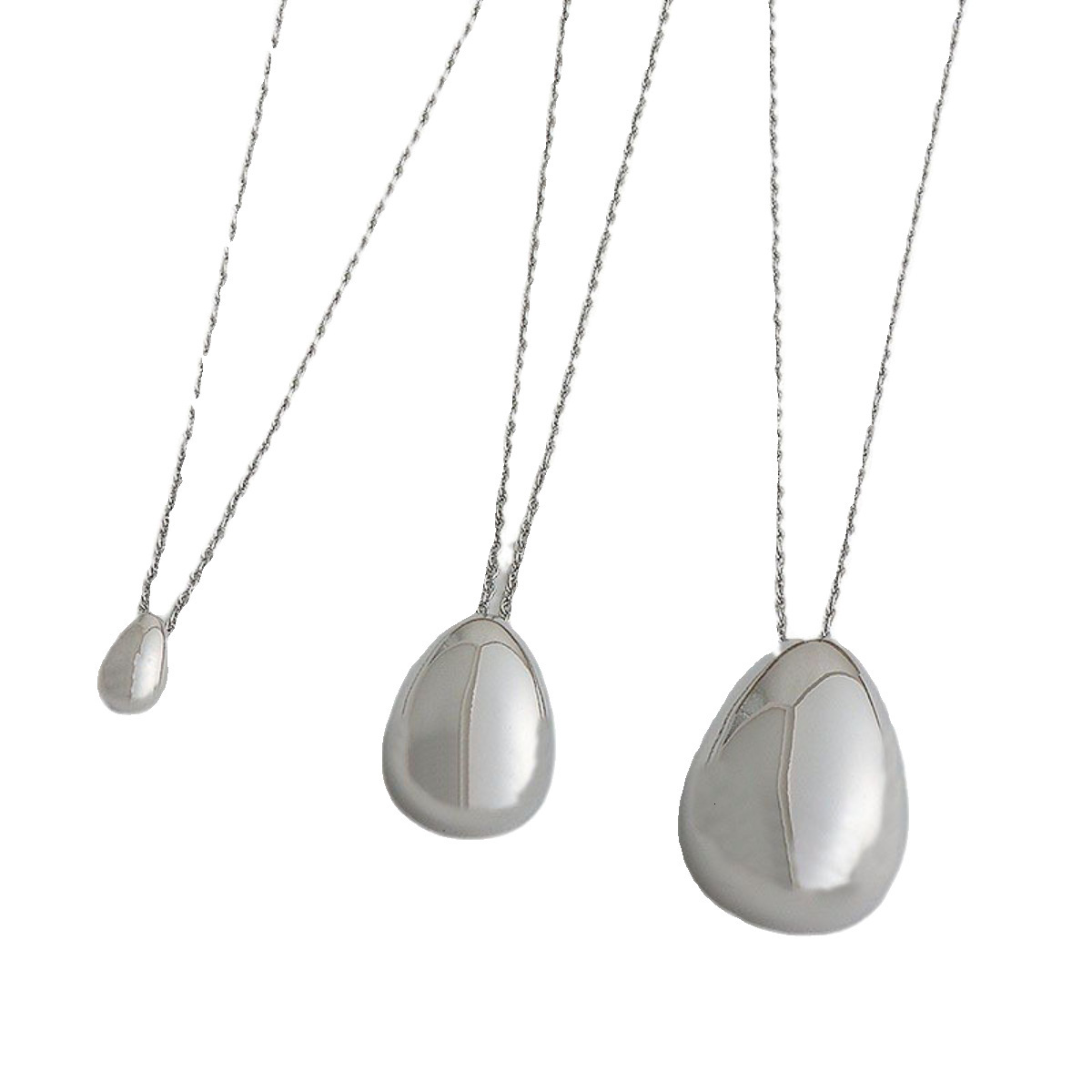 European American minimalist style, exaggerated oval pendant, simple design, cool and understated, large teardrop-shaped, polished pendant necklace
