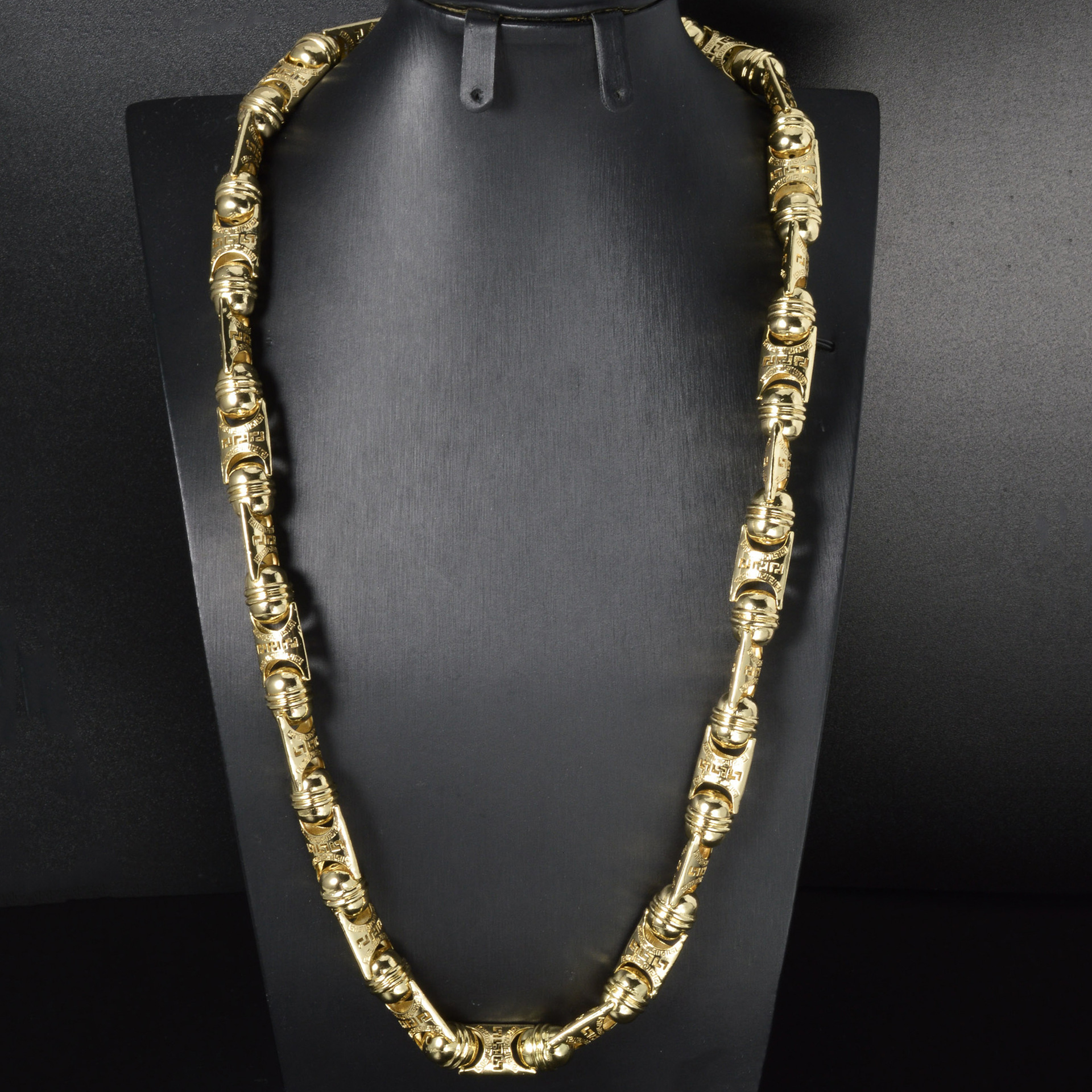 Middle Eastern long, hollow-link chain with intricate patterns, featuring round beads and bold, chunky design, a statement necklace for men