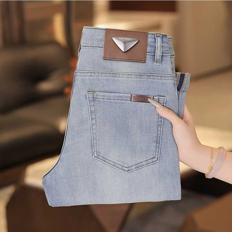 Designer Men's denim jeans 2026 autumn and winter thick men's jeans slim fit light color casual long pants jeans men's style with tri