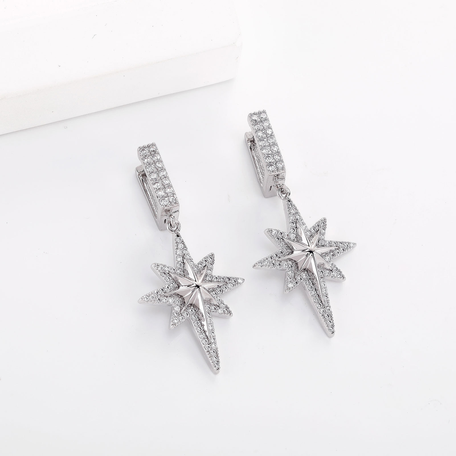 Korean-style ultra-shiny eight-pointed star moissanite Luxury Iced 925 silver Out D VVS Diamond studs, high-end earrings, exquisite and light luxury