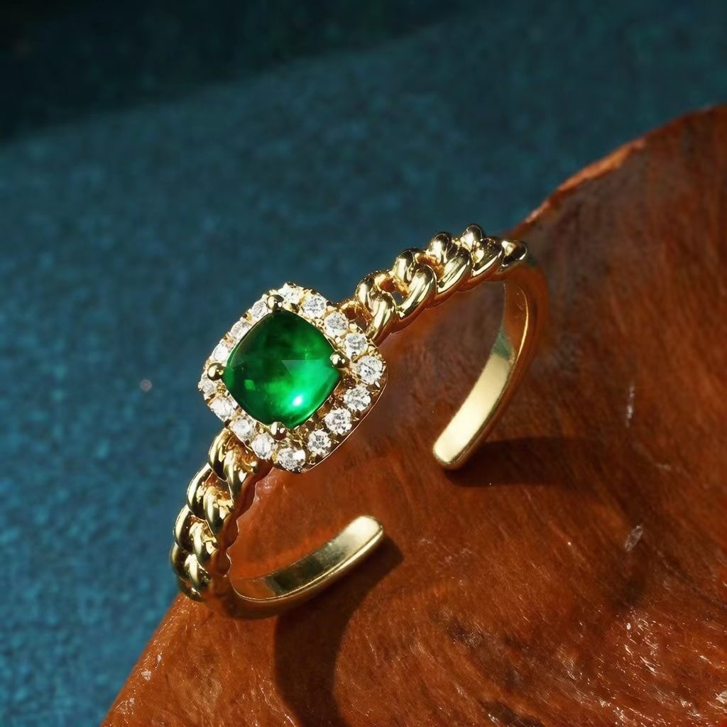 French-style vintage emerald sugar tower ring women, gold-plated, open design, with delicate embellishments, exuding a luxurious and elegant vibe,