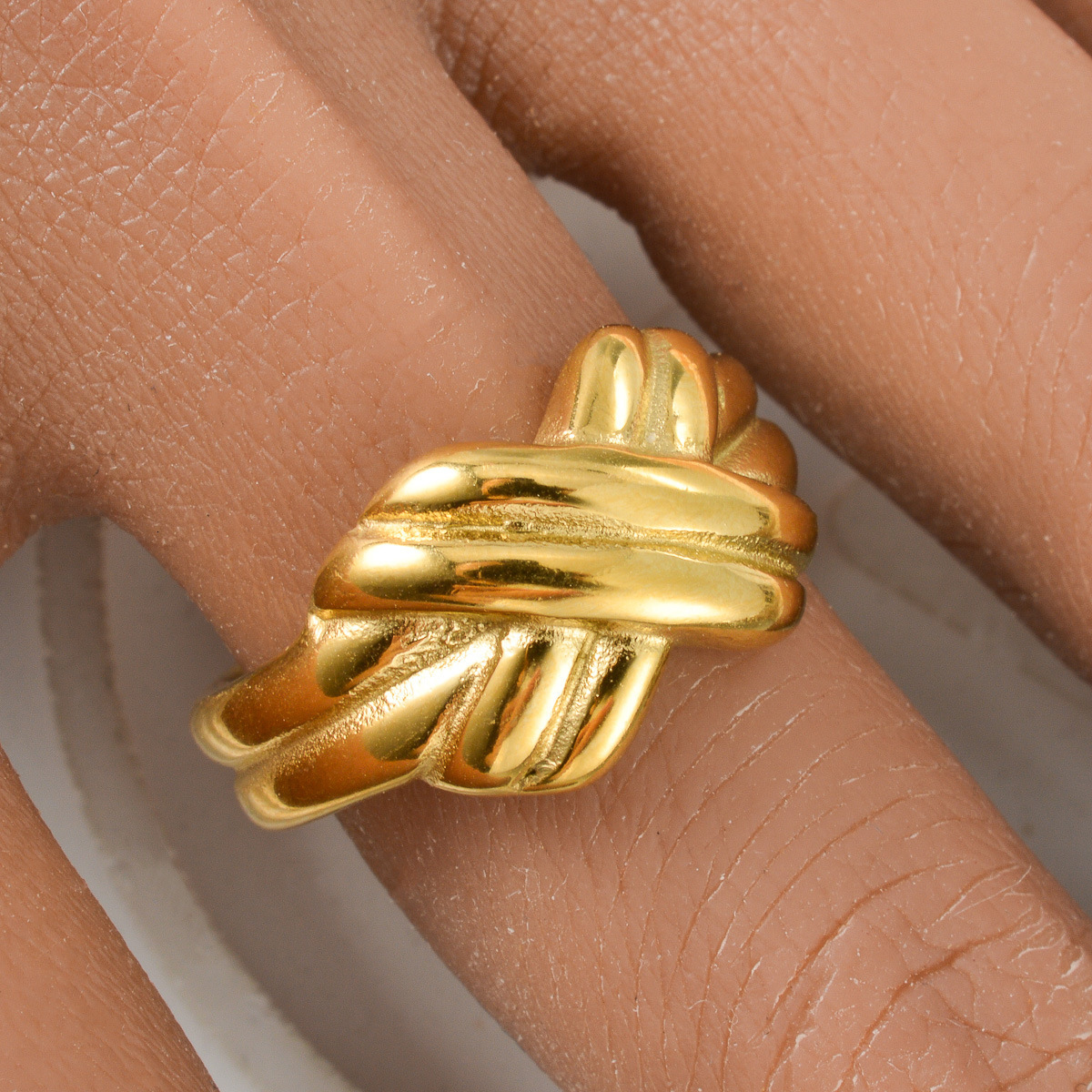 Korean-style gold geometric ring, a trendy and versatile ring for women, featuring an irregular braided design