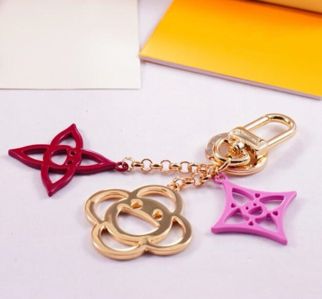 Designer Keychains Fashion bag Charms stylish Metal flower Key Chain High Quality L V Keychains for Men Women Car key ring Accessories 20 options to