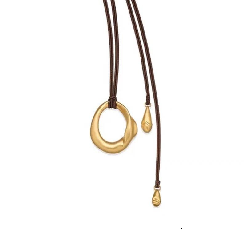 luxury style, same style as Dong Jie's, metal pendant necklace with black cord and round ring, long sweater chain for niche women