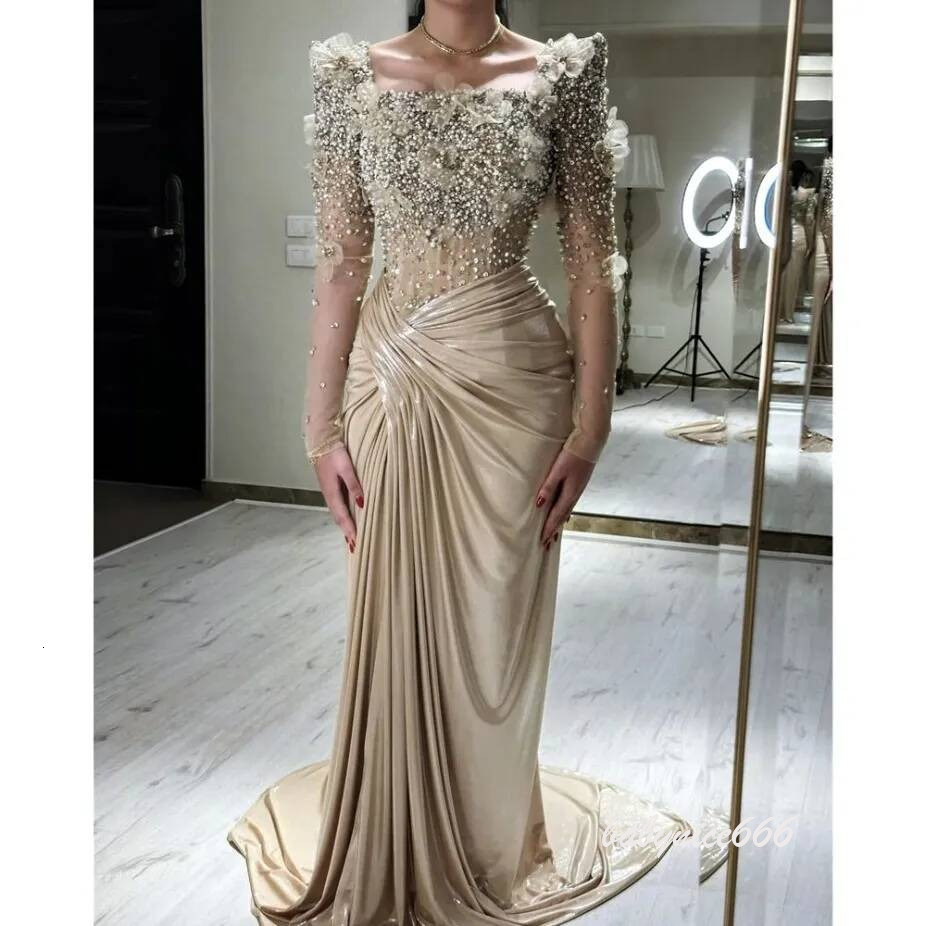 2026 Elegant Champagne Mermaid Evening Dresses Crystals Beads Long Slves Formal Occasion Gowns With 3D Floral Appliques Pleats Celebrity Mother Dres
