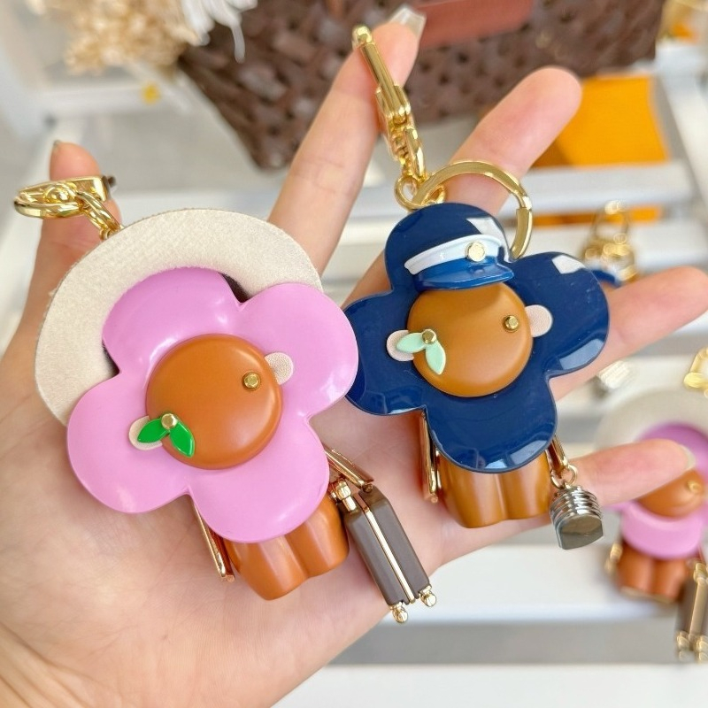 Luxury Flower Bag Charm Designer Leather Keychain Cute Cartoon Figure Key Ring 18K Gold Plated Handbag Pendant Stainless Steel Hardware Christmas Ac