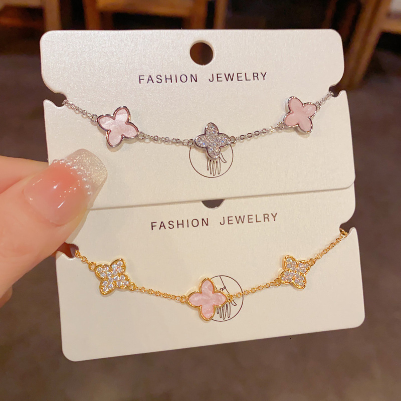 Bracelet de luxe léger en forme de trèfle à quatre feuilles rose, style japonais et coréen, en zircone cubique, à la mode