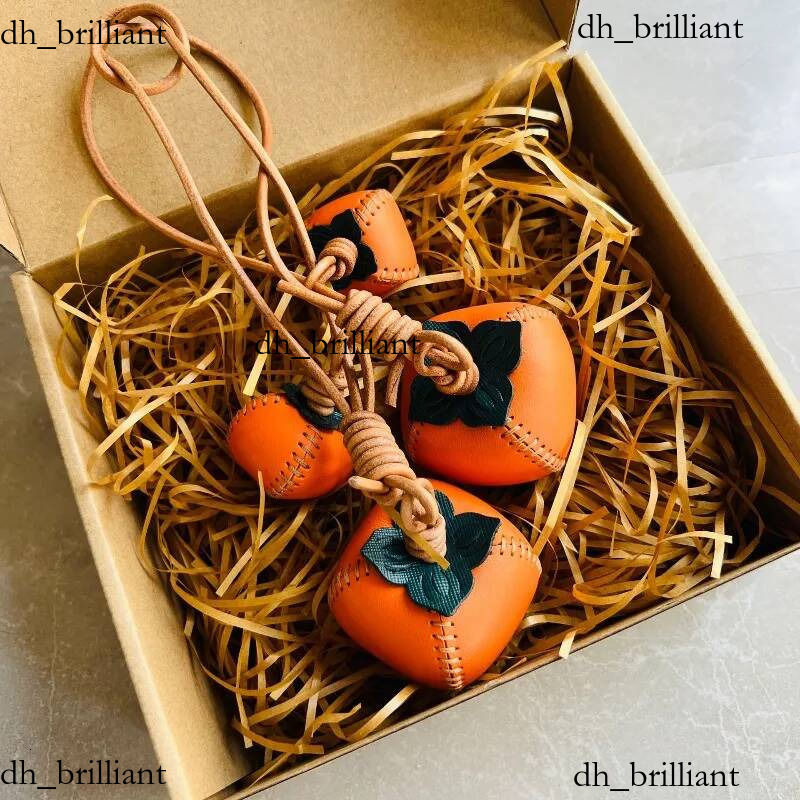 Porte-clés en cuir véritable, pendentif porte-bonheur, breloque pour sac, Double kaki, accessoire porte-bonheur pour clés de voiture, tendance, n