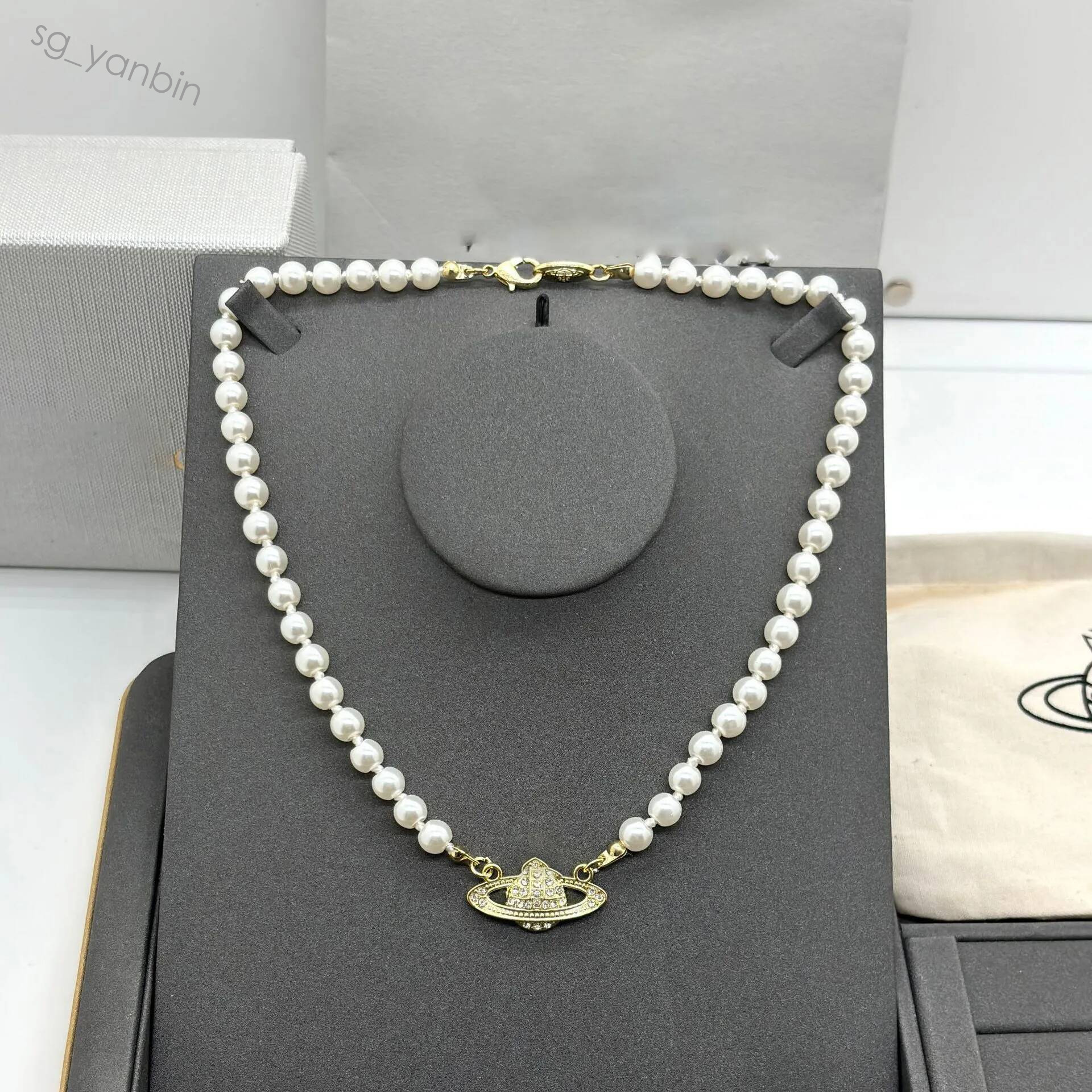 Saturn collier de perles femmes concepteur tridimensionnel planète cou chaîne pull argent plaqué élégant broche pendentif collier chaud