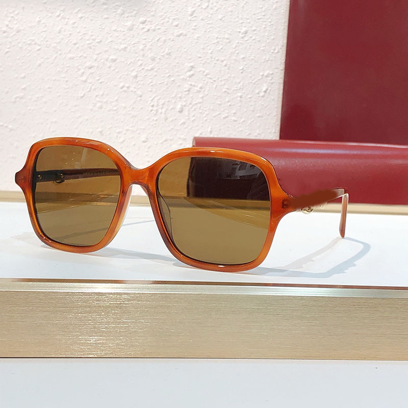 27SS Automne Fashion Designer Femmes Lunettes de soleil papillon 2217O Jambes décoratives en métal Cadre en acétate orange Lunettes pour hommes V