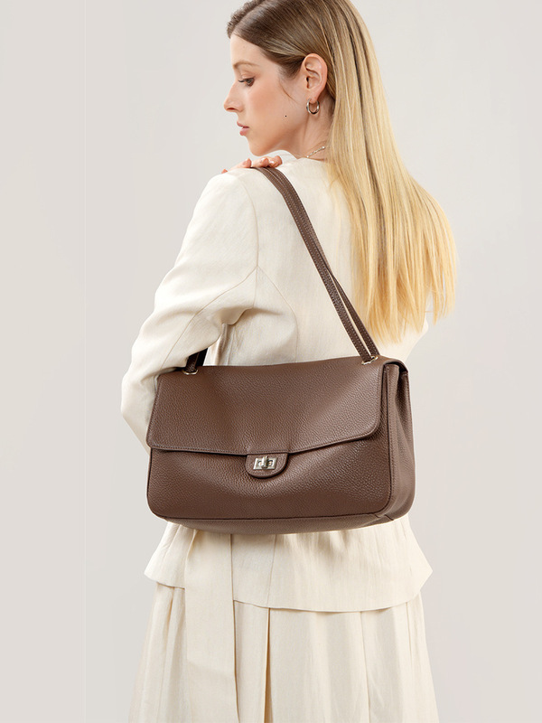 Sac de créateur vintage de luxe couche supérieure en peau de vache éléphant gris bandoulière avec un design unique nouvelle niche sous les bras s