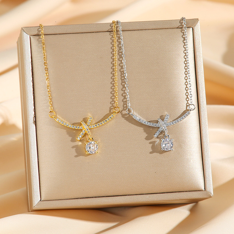 Chaîne de clavicule à pampilles avec nœud papillon, collier en acier titane exquis et sophistiqué et polyvalent