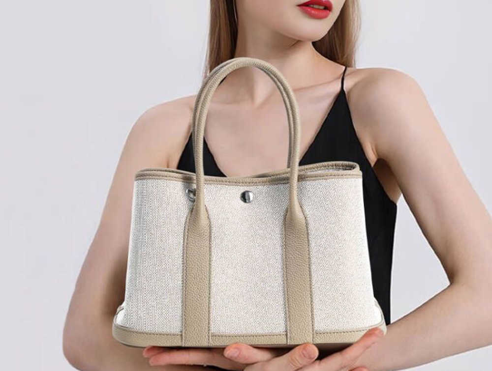 Small and high-end womens genuine leather handbag with top layer cowhide and large capacity canvas contrasting color garden tote bagL240903
