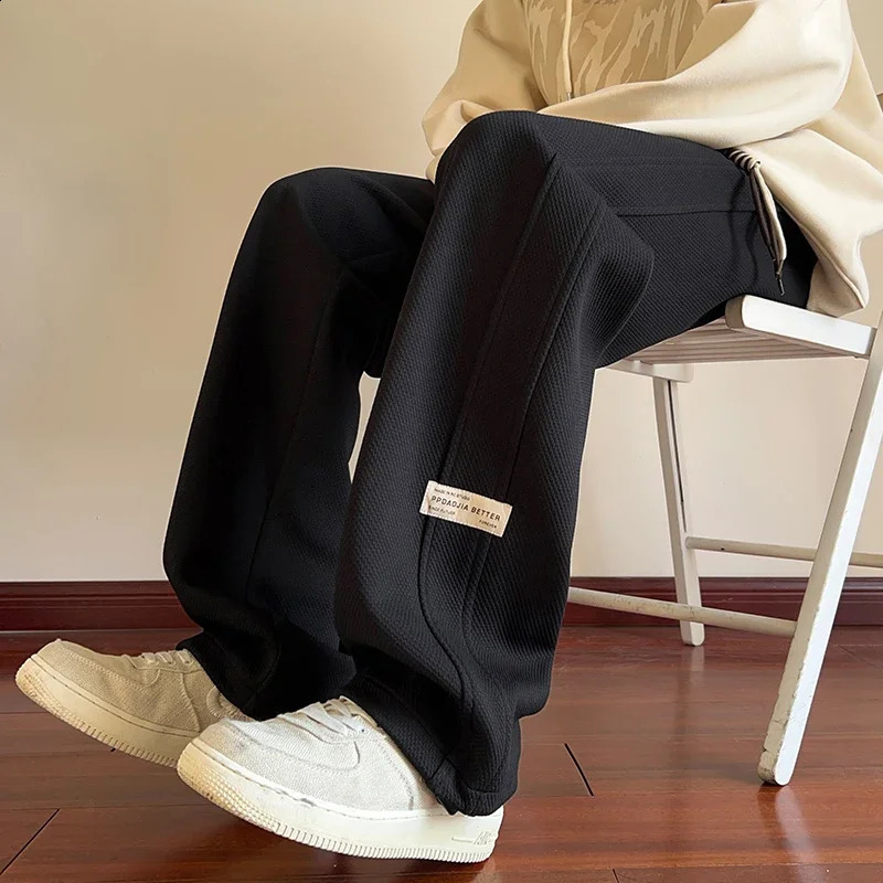 Pantalon de sport de jogger pour hommes pantalons de sac hip hop pantalon de la jambe droite de la jambe côté étiquette des vêtements de rue pant