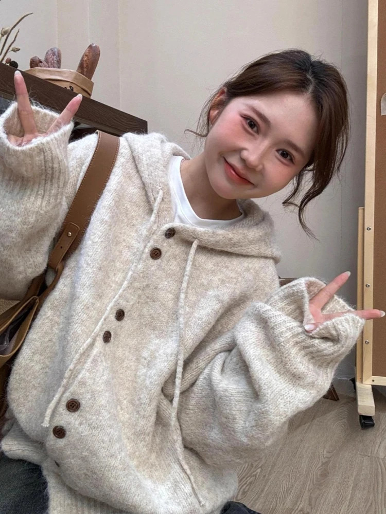 Womens hooded cardigan brushed buttons knitted cardigan Korean lazy style long sleeved sweater jacket autumn and winter style 240912