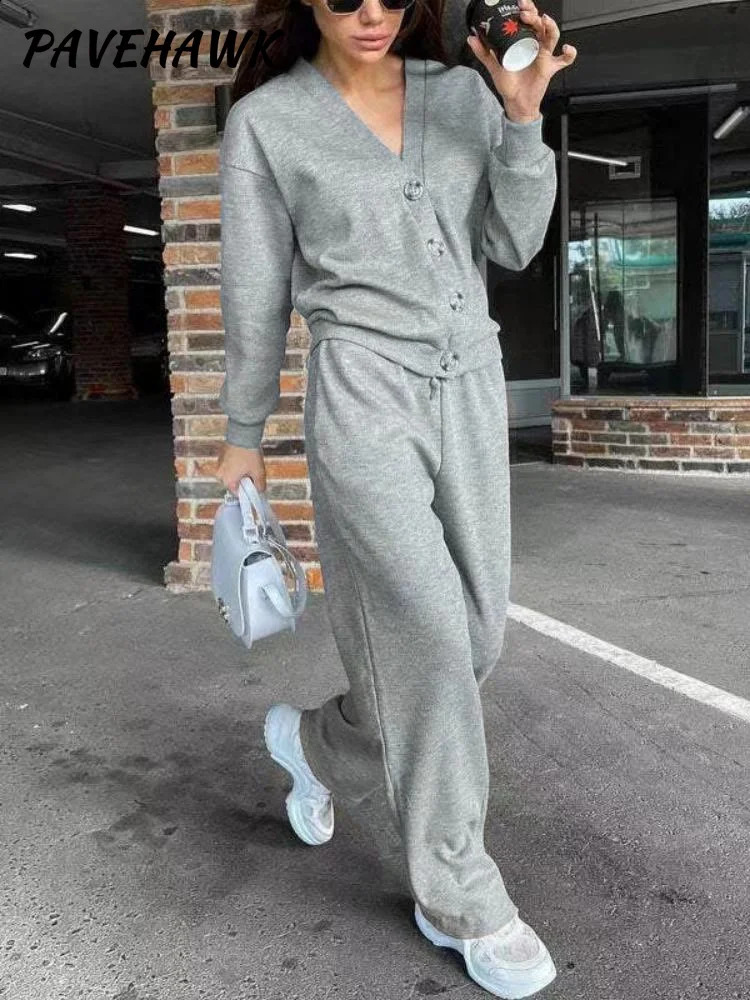 Pull cardigan lâche à poitrine unique en deux pièces tricotée avec pantalon de sport décontracté l'automne de mode solide de mode féminine 240912