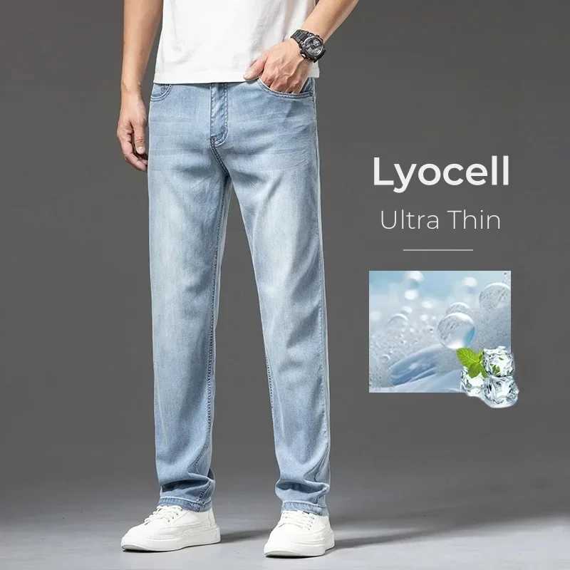 Jean pour hommes lyocell mince d'été associé à un pantalon en jean lâche et à la mode pour hommes glace fraîche troll décontracté bleu W240918