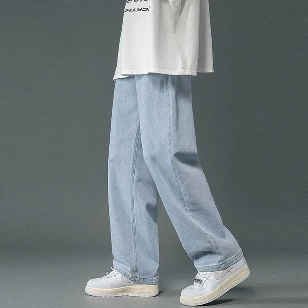 Nouveaux vêtements de vêtements de rue jeans coréens mode coréen lâche pantalon de jambe larges de jambe masculine noir et blanc 3xl w240918