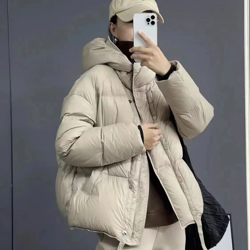 Veste en bas des femmes d'hiver avec collier à la mode et veste chaude à capuche coréenne Version coréenne Veste parka décontractée 240919