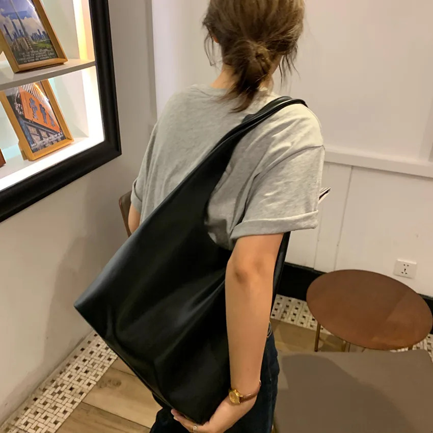 Nouveau modèle Trend Femme décontractée Sac à bandoulière Pu Tote Handsbag Femme Shopping Soft Wrap Loison Leisure en cuir Lady Trend Purse Sacs