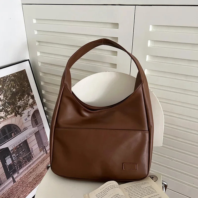 Nouveau modèle Femmes Vintage Hobo tendance tendance seau tendance pu solide épaule grande capacité enveloppe rétro fourrelle à main soft inverse