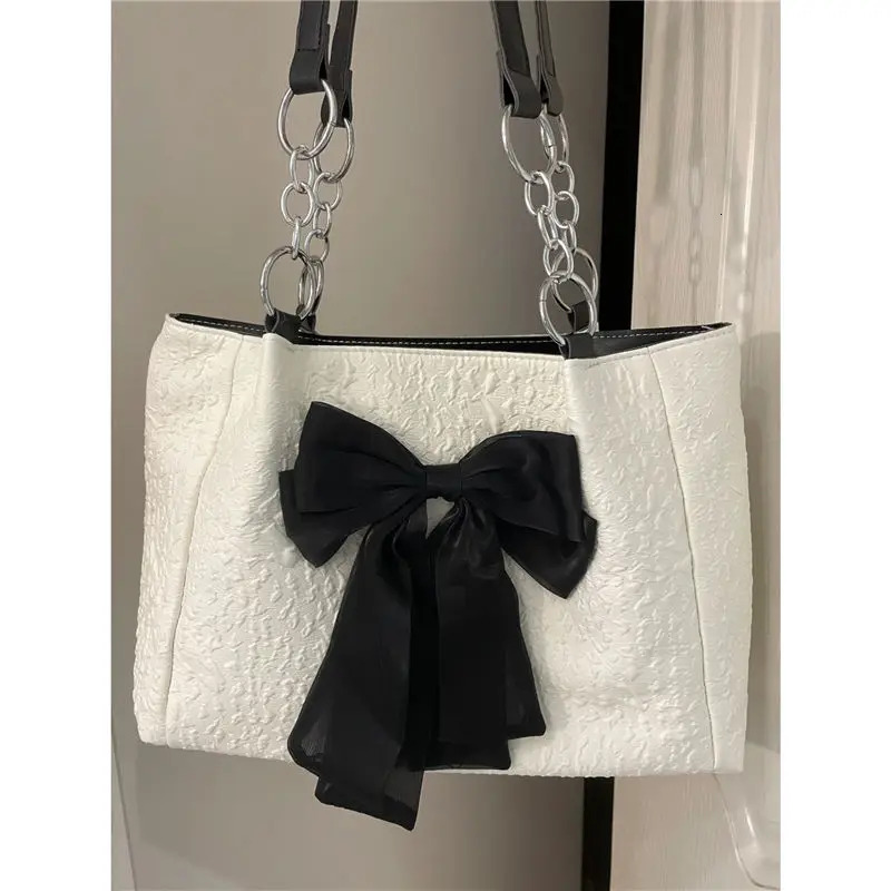 Nouveau modèle Bags de bodal pour femmes enveloppement coréen nouveau Big Big Trend Bowknot Tote Tendance Canvas Summer High Capacité mignonne Si