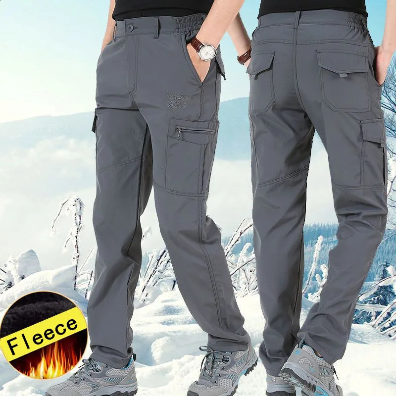 Pantalon de cargaison chaude épais d'hiver avec doublure en laine décontractée extérieure imperméable sac à main porte-bagages de jogging Pantalo